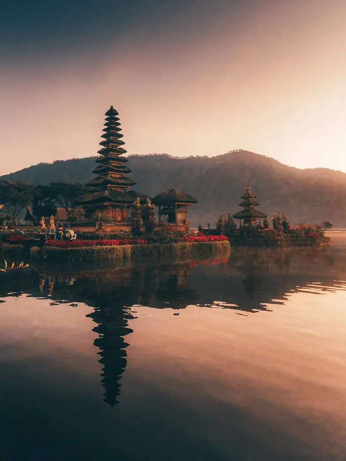 The Ulun Danu Beratan temple mirrored in the lake at dusk, Bali, Indonesia