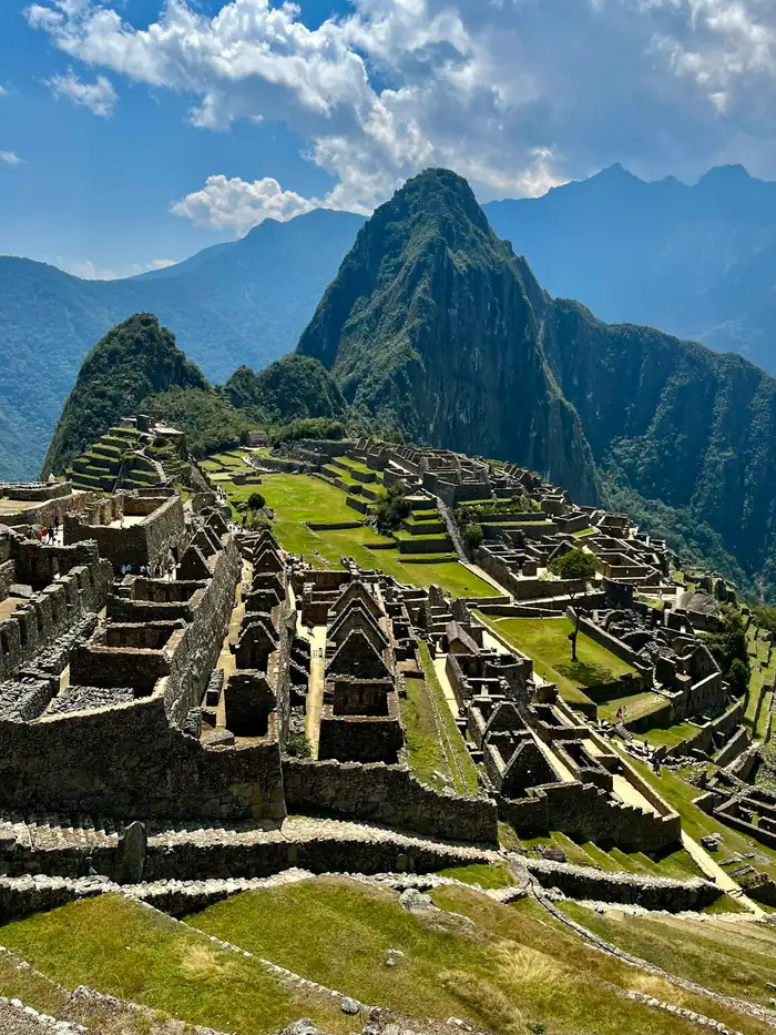 The terraces of Machu Picchu below the peak of Huayna Picchu, Peru